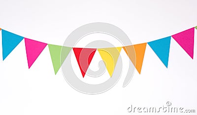 Colorful hanging paper flags on white wall background, decor items for party, festival, celebrate event Stock Photo