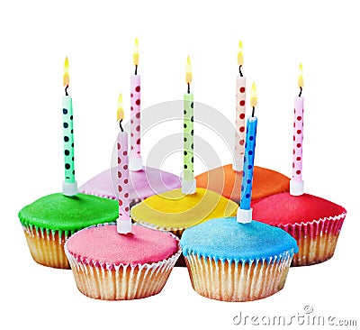 Colorful happy birthday cupcakes with candles Stock Photo