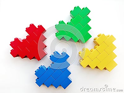 Colorful heart built toy blocks on white background Stock Photo