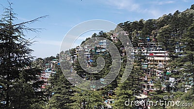 Colorful Hillside Buildings in Spiritual Travel Destination Dharamshala, India Stock Photo