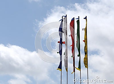 Colorful Himalayan Tibetian prayer flags on pole. Stock Photo