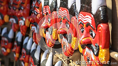 Colorful Hindu mythological demon handicraft masks Stock Photo