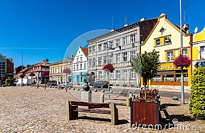 Colorful historic tenement houses at Rynek main market square in old town quarter of Trzebiatow in Poland Editorial Stock Photo