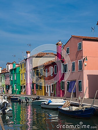 Colorful homes on the canal in Burano Italy Editorial Stock Photo