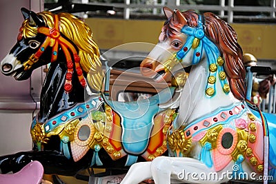 Colorful horses on carousel Stock Photo