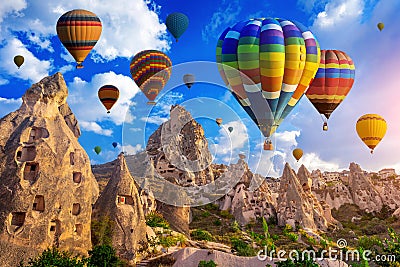 Colorful hot air balloon flying over Cappadocia, Turkey. Stock Photo