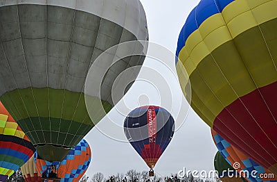 Colorful hot air balloons in flight at the festival of aeronautics in Kyiv Editorial Stock Photo