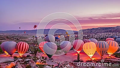 Colorful hot air balloons before launch in Goreme national park, Cappadocia, Turkey Stock Photo