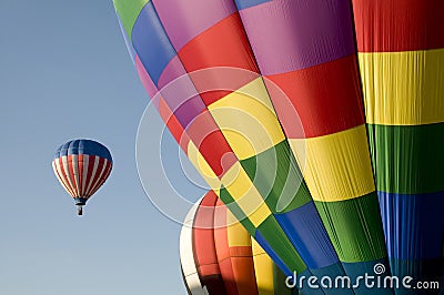 Colorful hot air balloons launching Stock Photo