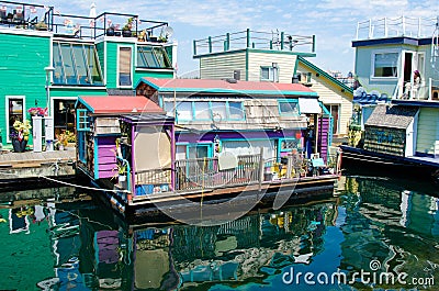 Colorful house boats at Fisherman's Wharf in Victoria, BC. Editorial Stock Photo