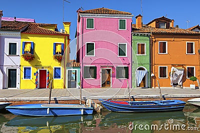 Colorful houses and canal on Burano island, near Venice, Italy. Editorial Stock Photo