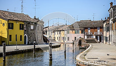 Colorful houses and canal in Comacchio, Emilia Romagna, Italy Stock Photo