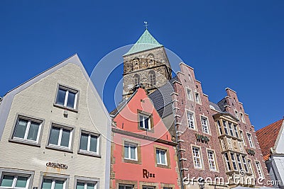 Colorful houses and church tower in the center of Rheine Editorial Stock Photo