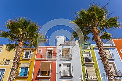 Colorful houses and palm trees in Villajoyosa Stock Photo