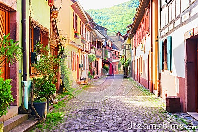 Colorful houses in picturesque street, Kaysersberg, Alsace, France Stock Photo
