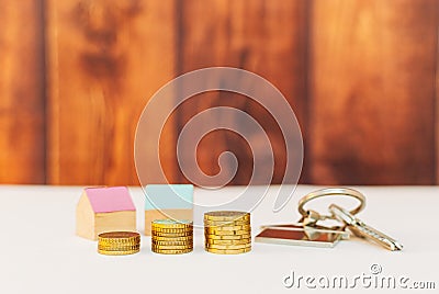 Colorful houses with stack coins Stock Photo