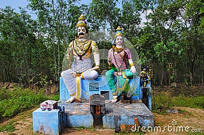 Colorful idols of Indian god and goddess, on the way to Kumbakonam, Tamil Nadu, India Stock Photo