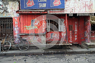 Colorful indian house. Bright red building in Kolkata Editorial Stock Photo