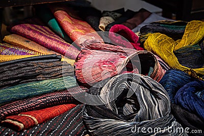 Colorful indian silk scarves on sale in a shop Stock Photo