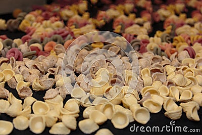 Colorful Italian Uncooked Pasta Assortment on Table Stock Photo