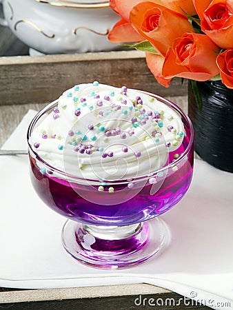 Colorful jelly with whipped cream Stock Photo