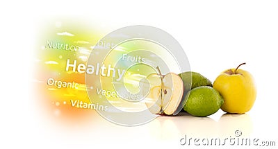 Colorful juicy fruits with healthy text and signs Stock Photo