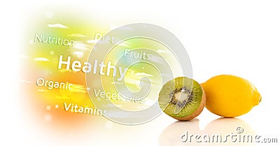 Colorful juicy fruits with healthy text and signs Stock Photo