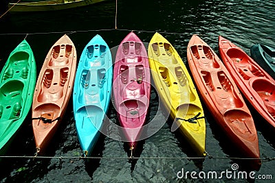 Colorful kayaks in Bulusan Natural Volcano Lake Park Stock Photo