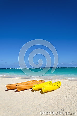 Colorful kayaks on the tropical sandy beach Stock Photo