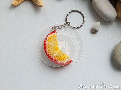 Colorful key chain and sea stones Stock Photo