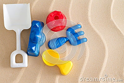 Colorful kids plastic toys at the beach Stock Photo