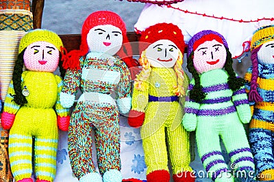 Colorful knitted babies. Editorial Stock Photo