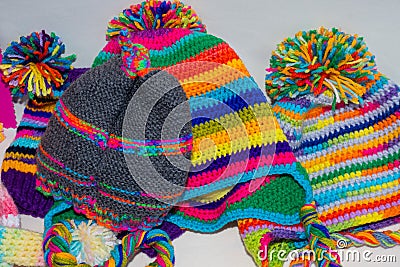 Colorful knitted headpiece for kids for sale at the Christmas market Editorial Stock Photo