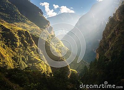 Colorful landscape with high Himalayan mountains, green forest Stock Photo