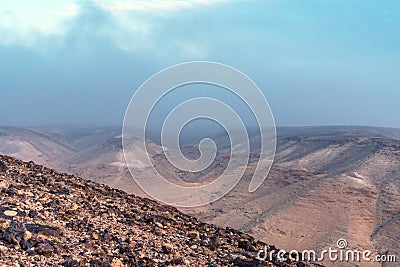 Colorful landscape view on judean desert with magic blue sky on background and colorful deep clouds Stock Photo