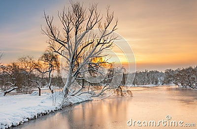 Colorful landscape at the winter sunrise in park Stock Photo