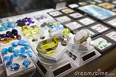 Colorful gems and semi-precious stones in jewelry store Stock Photo