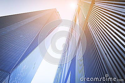 Colorful light shines on tall modern skyscrapers in New York City Stock Photo