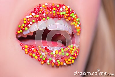 Colorful lipstick. Summer jam. Hot music song. Open female mouth sings. Tasty lips. Candy lips. Confectionery. Stock Photo