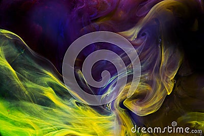 Colorful liquids underwater. Violet and yellow constrast Stock Photo