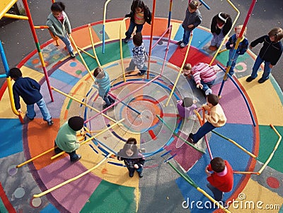 Children playing with hula hoops and jump ropes Stock Photo