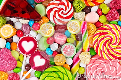 Colorful lollipops and different colored round candy. Stock Photo