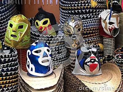 colorful Lucha Libre Mexican professional wrestling masks on sombreros Editorial Stock Photo