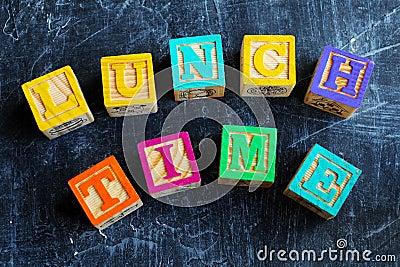Colorful lunch wooden blocks Stock Photo