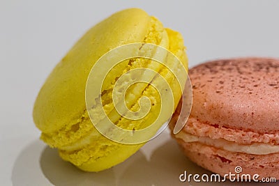 Colorful Macarons french delight yellow and pink Stock Photo