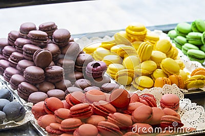 Colorful macarons in showcase, patisserie, and sweetshop Stock Photo