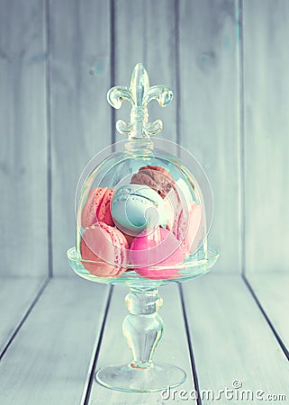 Colorful macaroons in a glass vase Stock Photo