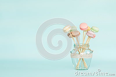 Colorful macaroons on wooden sticks Stock Photo