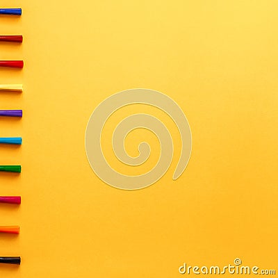Colorful markers arranged in a row. Concept desk. Top view real photo Stock Photo