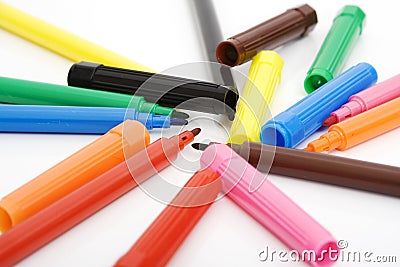 Colorful markers and caps Stock Photo